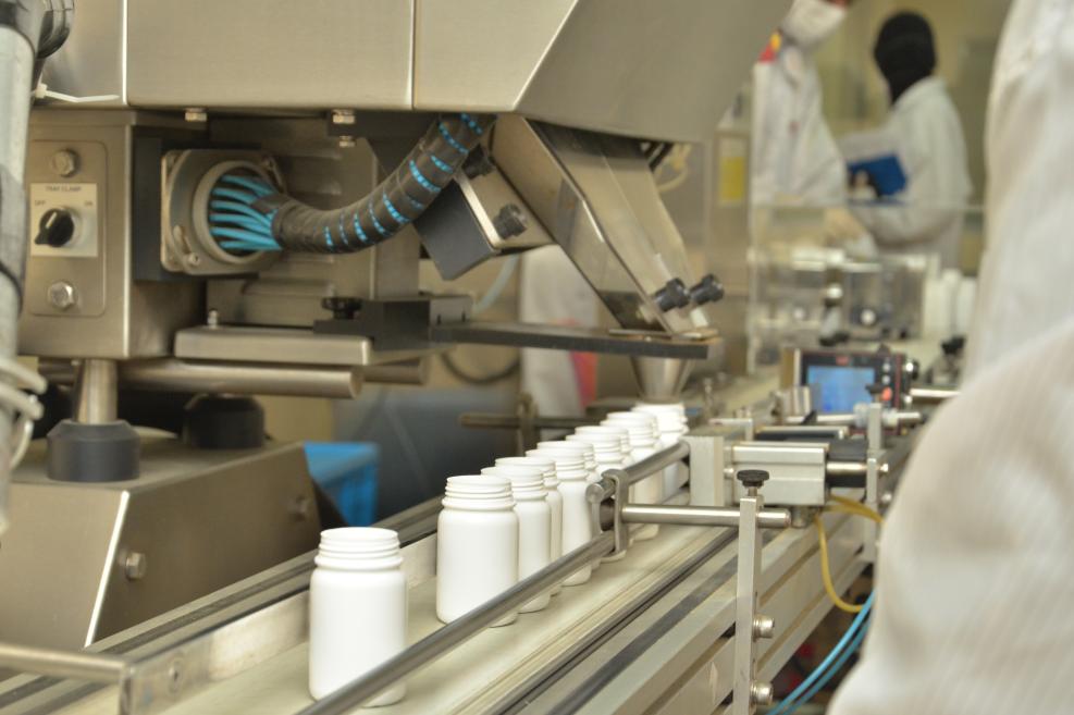 Insert capsule into the bottles